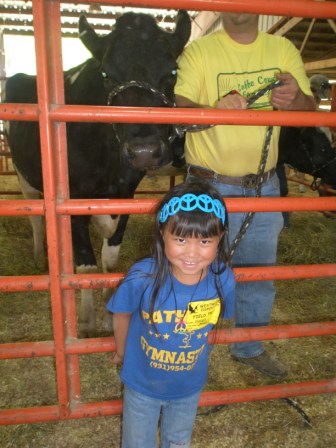 Kasen with cows at Farm City Day